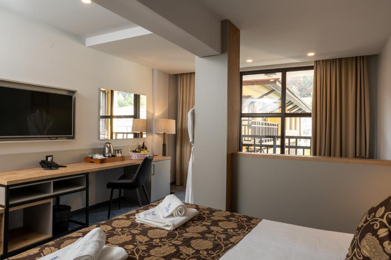 Grand Hotel فيلينغراد المظهر الخارجي الصورة A room at the hotel